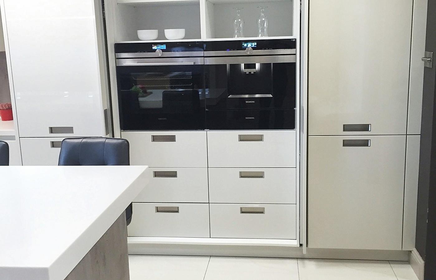 Pocket doors concealing appliances